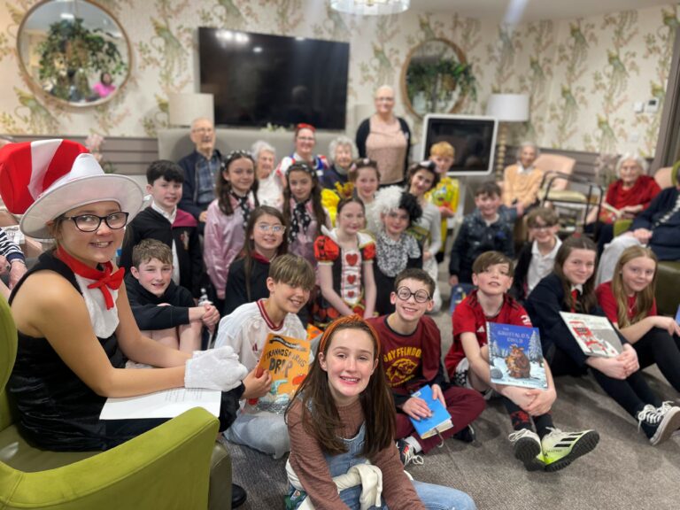 Bolton care home shares stories with children for World Book Day