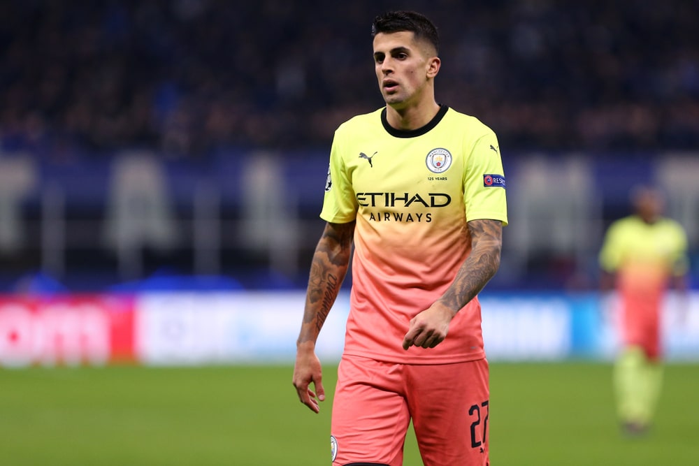 Joao Cancelo playing football for Man City