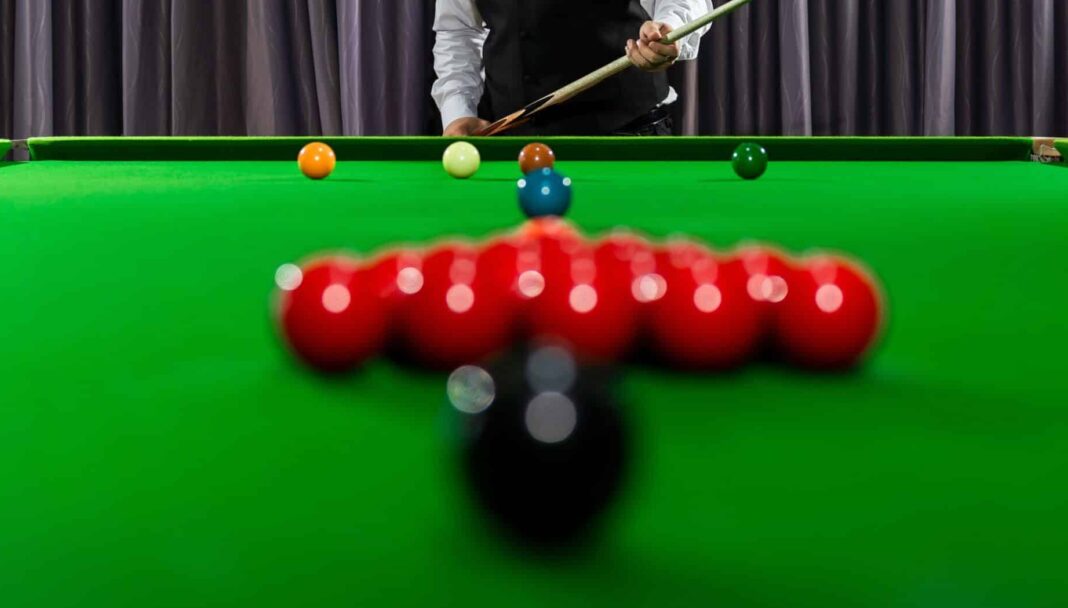 A snooker table before the break.