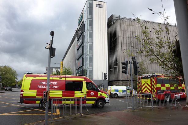 0 Emergency services outside The Rock car park in Bury