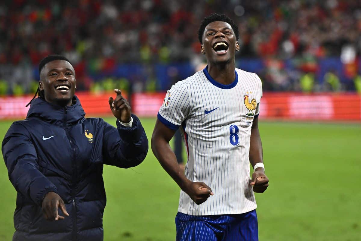 Eduardo Camavinga, Aurelien Tchouameni of France celebrate winning the UEFA EURO 2024 quarter-final. Volksparkstadion on July 5, 2024 in Hamburg, Germany.