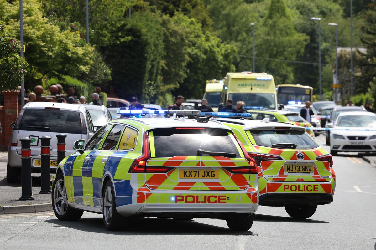 Police taped off the road on Frederick Street, Oldham