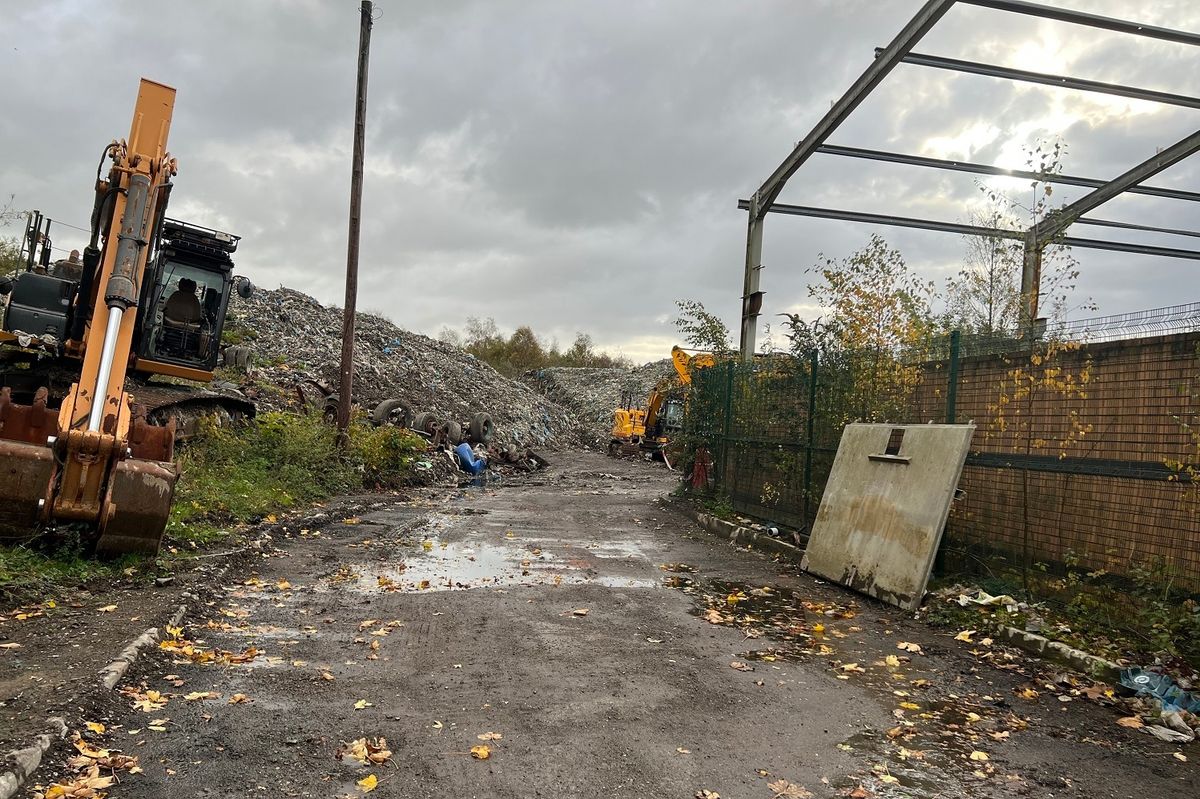 The Environment Agency has been leading a criminal investigation into the illegal dump near residential homes in Wigan 