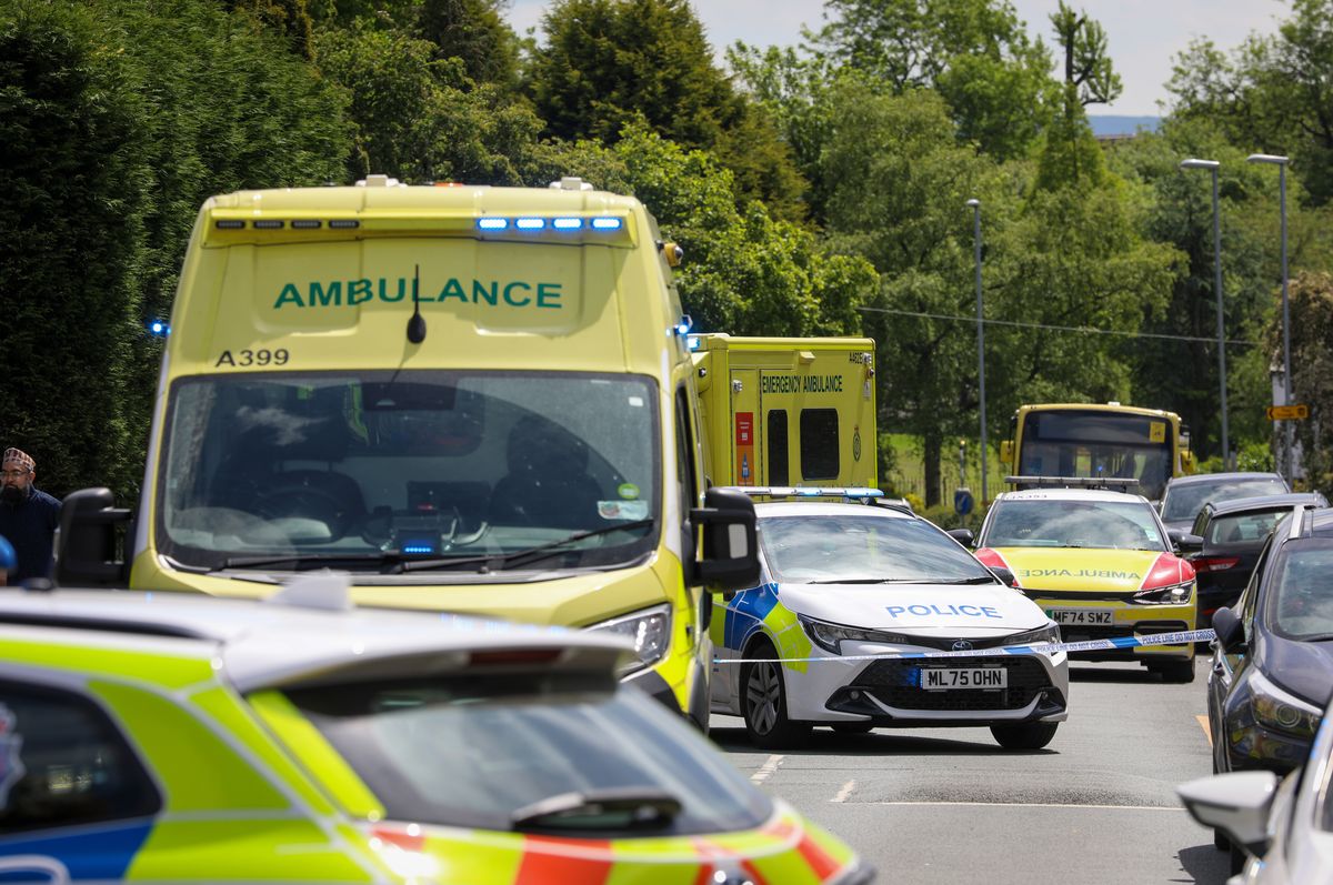Police and ambulance crews attend the scene on Frederick Street