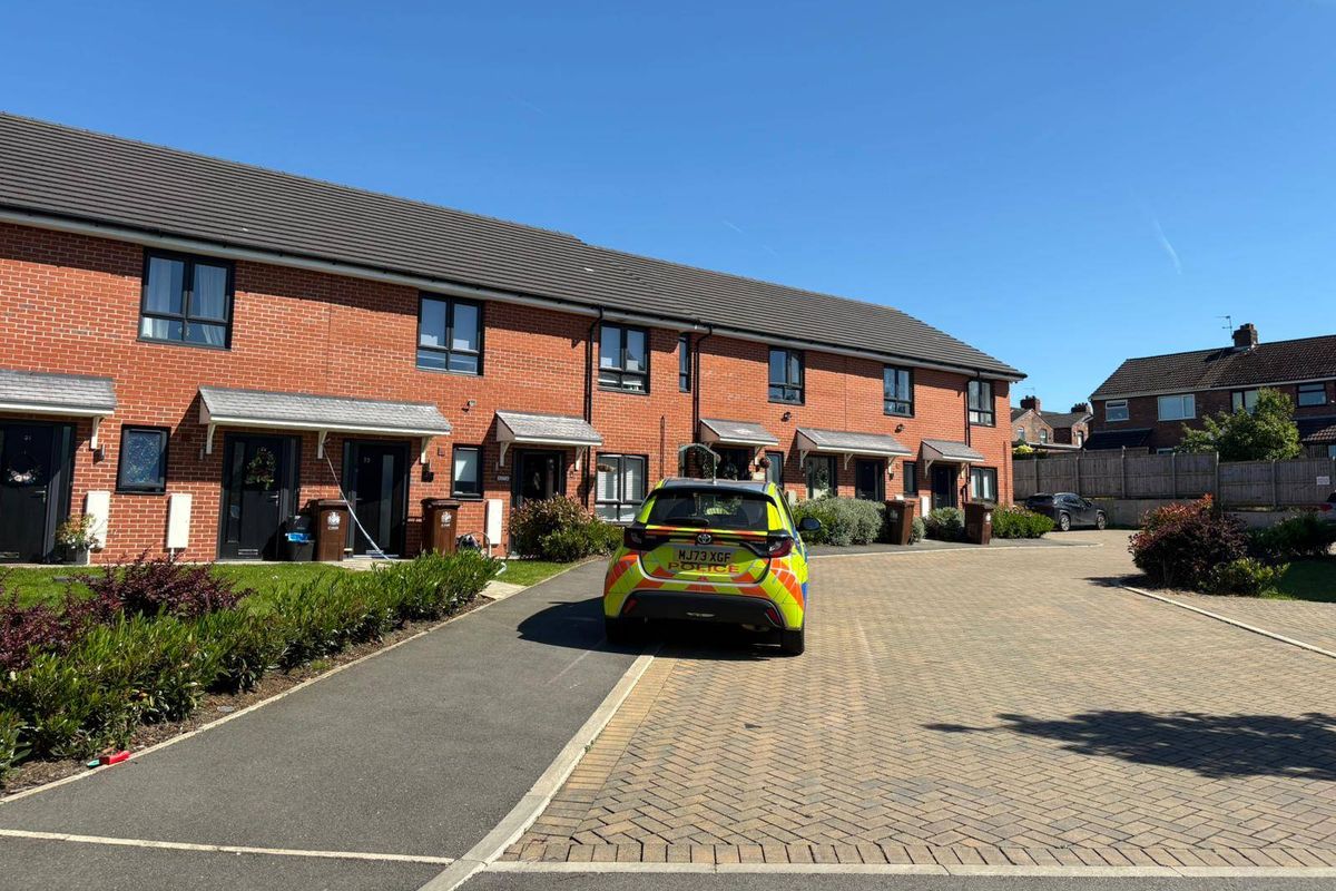 Police in Brook Cottage Close following the unexpected death of a woman in her 30s