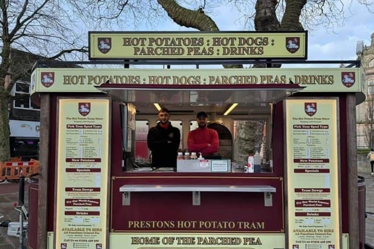 Harley and Jacob Nelson in the current hot potato tram on the Flag Market